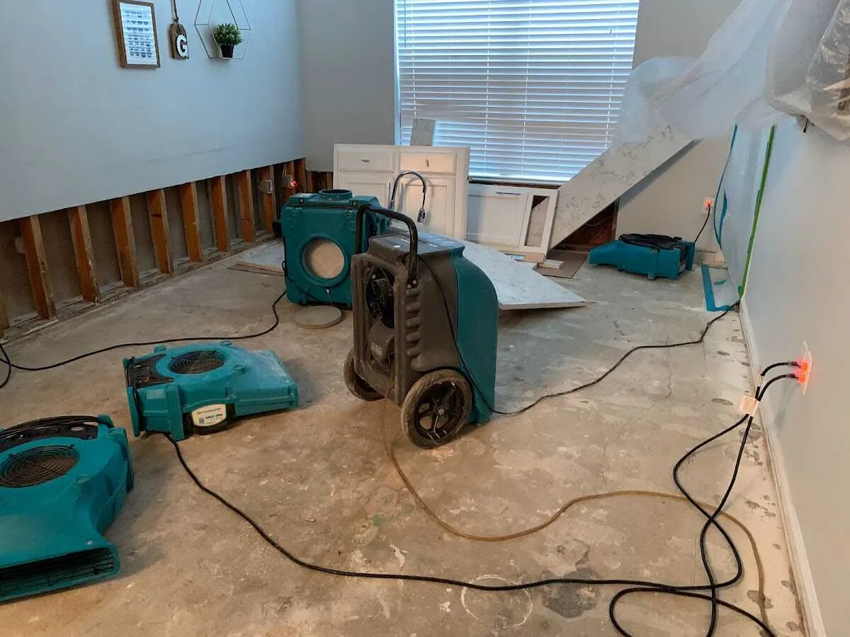 Dehumidifier in flood-cut room for Water Damage Restoration in Oakbrook